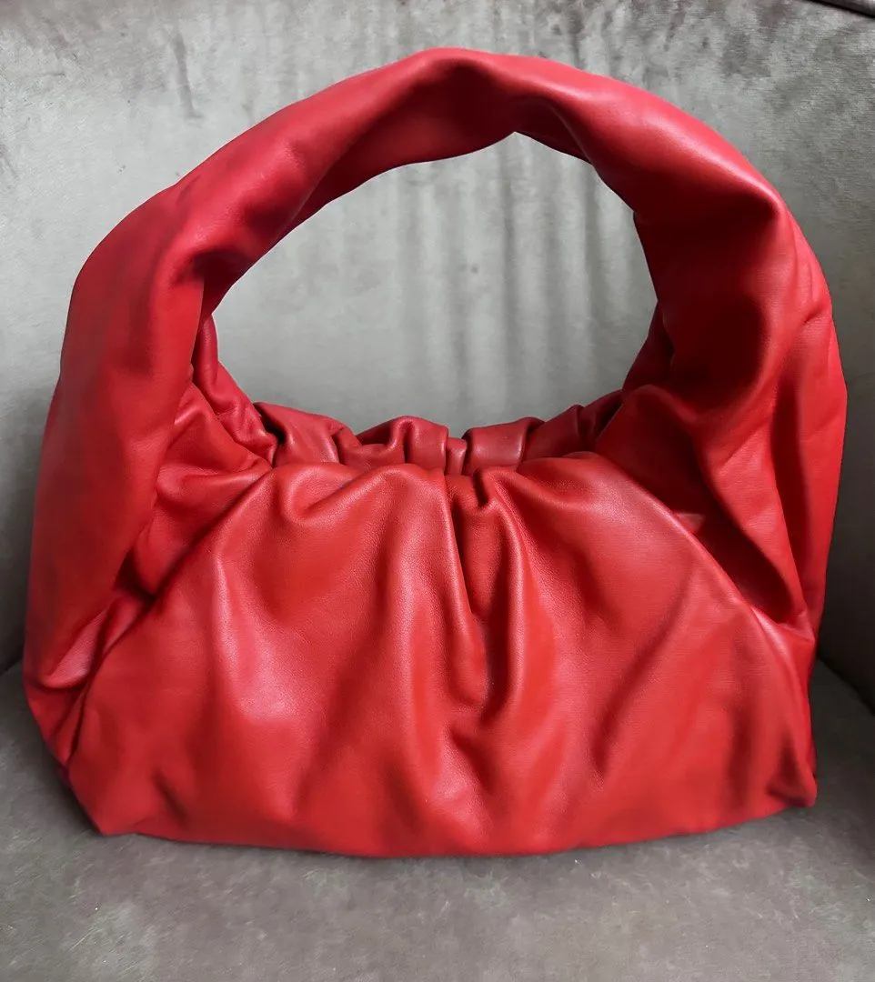 <b> BOTTEGA VENETA</b> <br>The Pouch Shoulder Bag